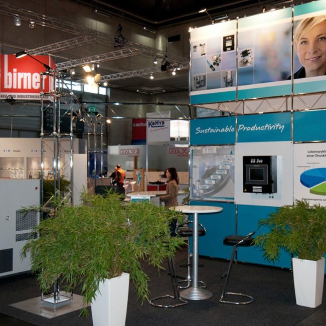 Inselstand Messeauftritt Atlas Copco Foto Messestand Atlas Copco